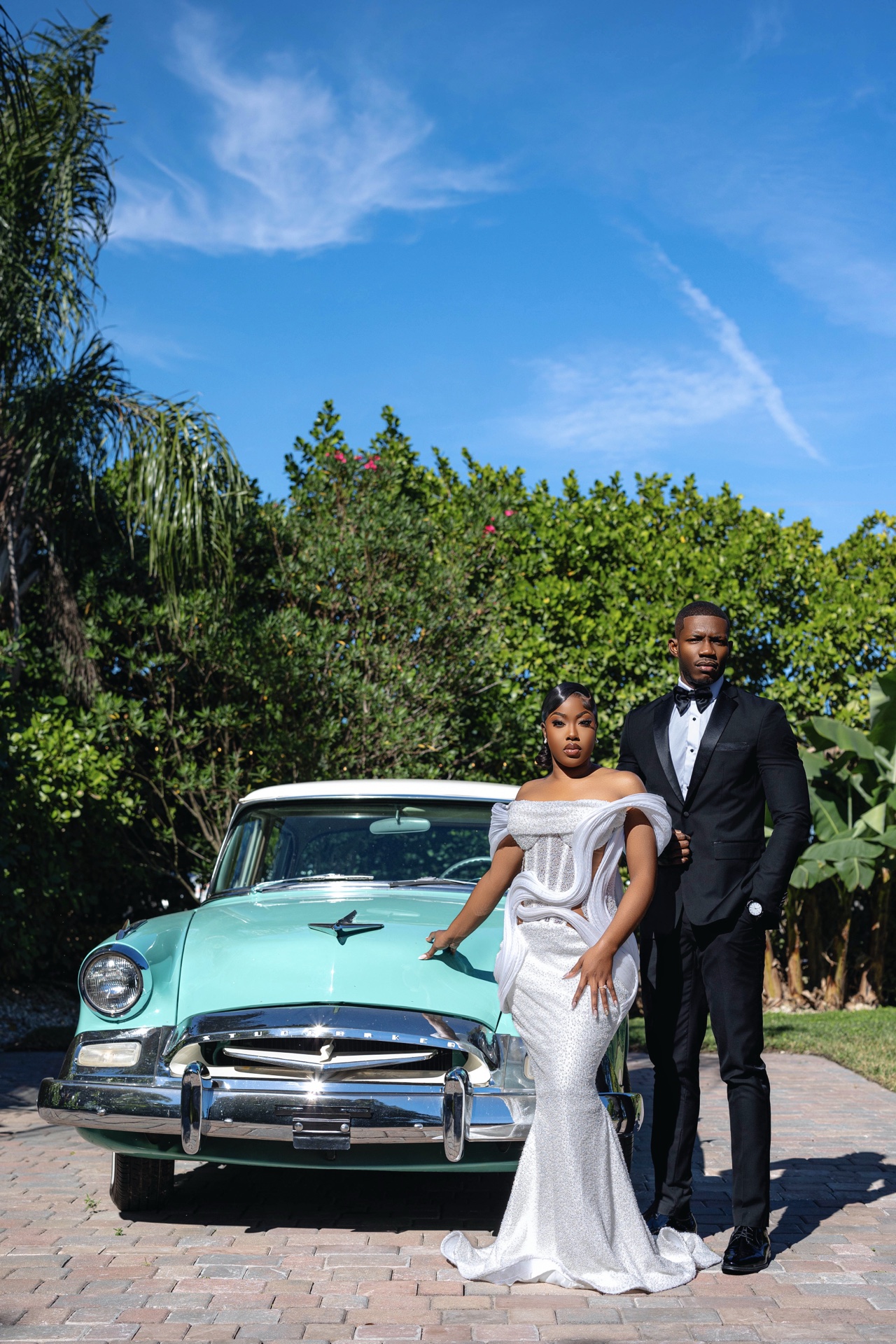 Couple with a vintage car in South Florida