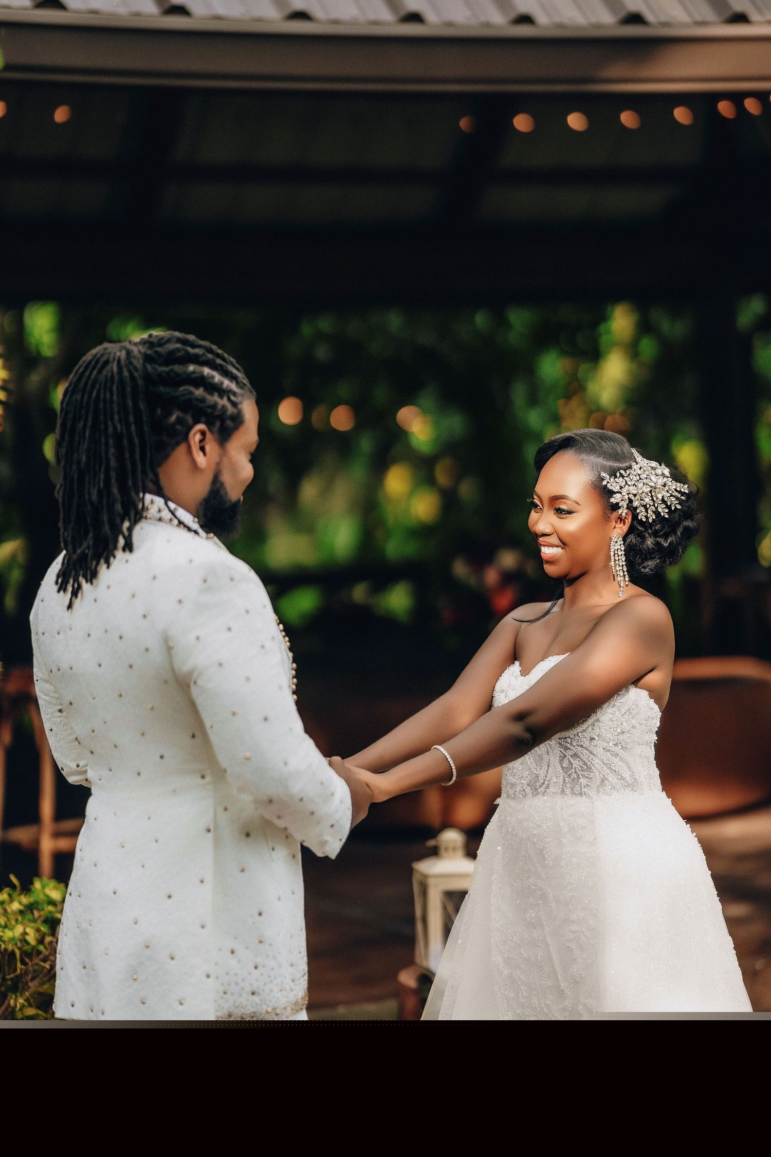 Couple holding hands during their first look