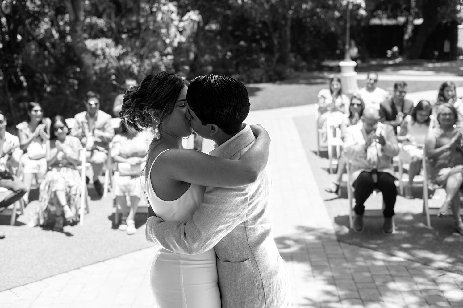 Black and white frame of the couple close together