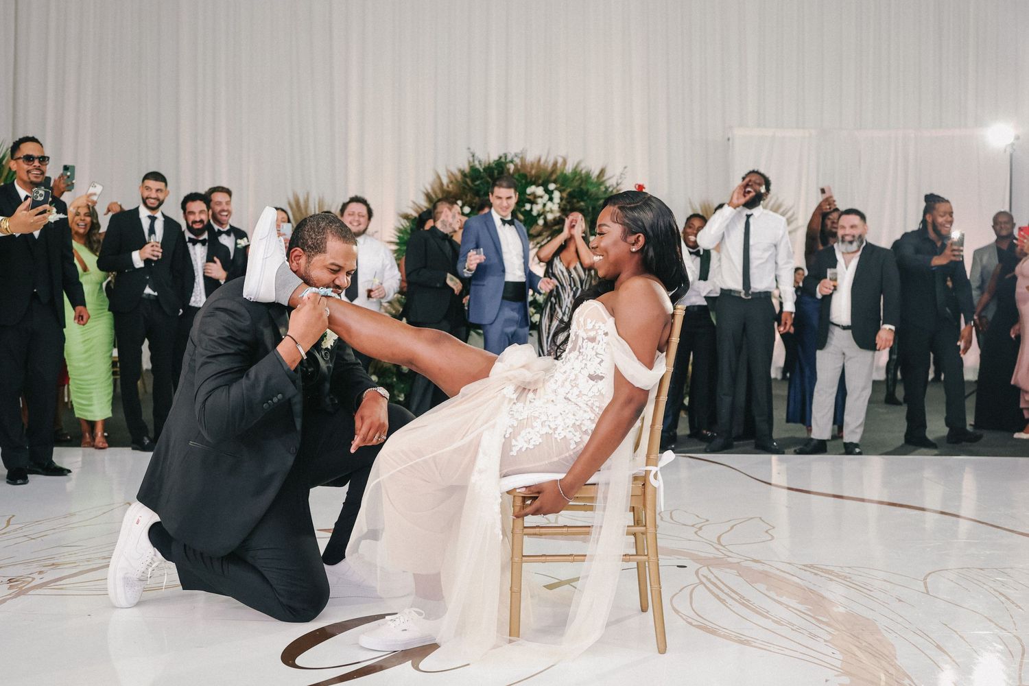 Couple dipping on the reception floor