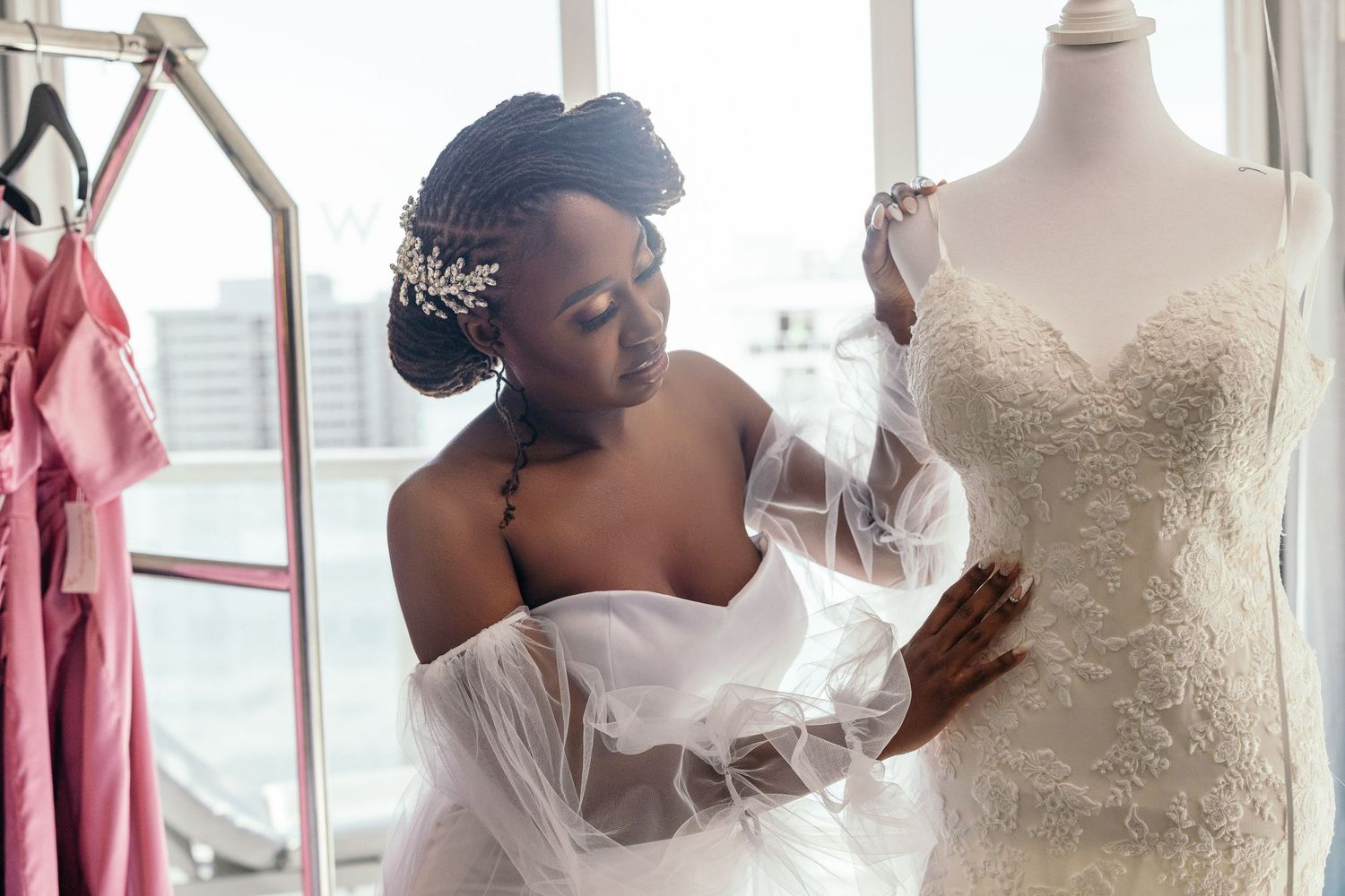 Bride and her bridesmaids getting ready together