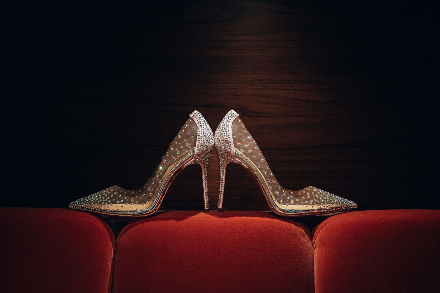 Wedding shoes waiting on a velvet chair