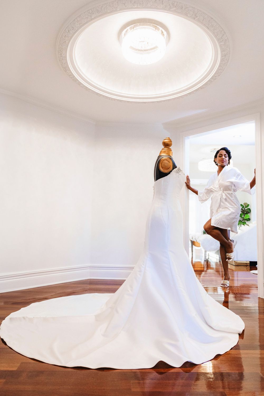Bride in a gown with dramatic sleeves